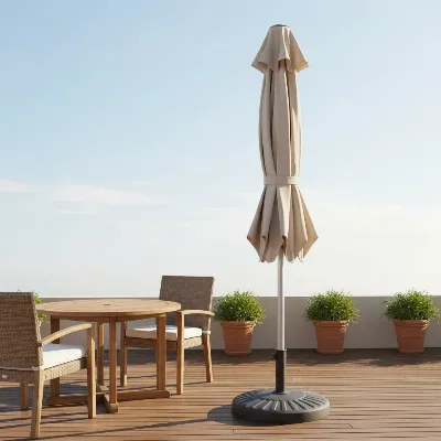 Closed patio umbrella secured with a tie strap on a deck patio