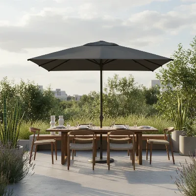 A large Crate and Barrel rectangular patio umbrella shading an outdoor dining table in a modern patio setting.