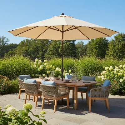 A stylish patio umbrella providing ample shade over an outdoor dining table.