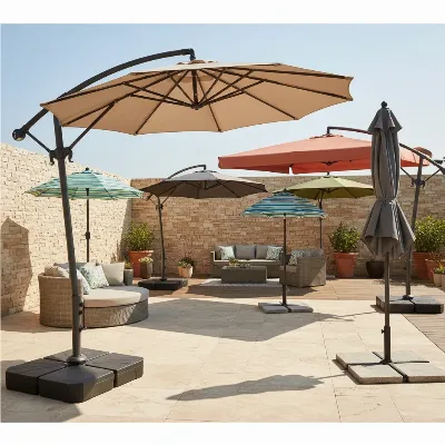A collection of diverse, high-performance patio umbrellas specifically designed for windy conditions, featuring various styles, strong frames, and vented canopies in a well-lit outdoor setting.